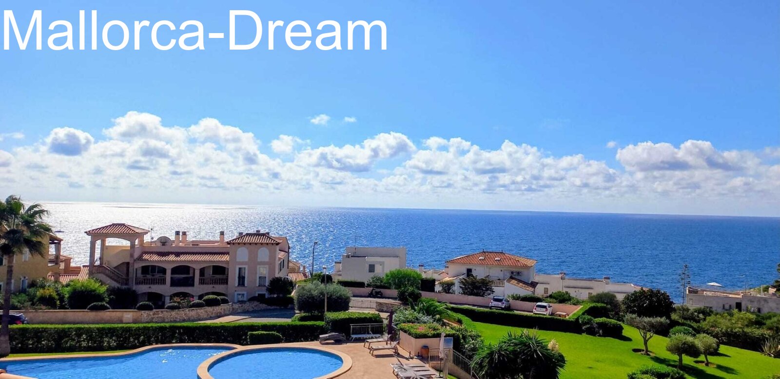 Porto Cristo Novo: Penthouse apartment with private roof terrace, sea view, palm-lined pool + parking space in a top complex 