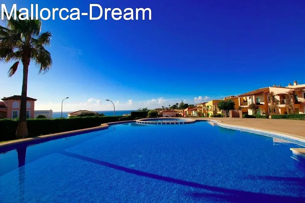 Porto Cristo Novo:   Bungalow de 3 dormitorios con vistas al mar y piscina con palmeras en un complejo de lujo 